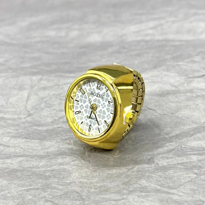 bague montre femme vintage motif trèfles doré acier