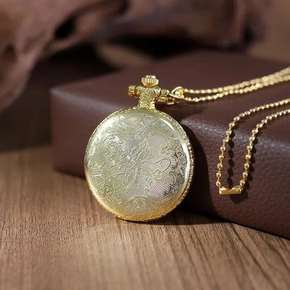 Collier montre femme vintage dorée sur support